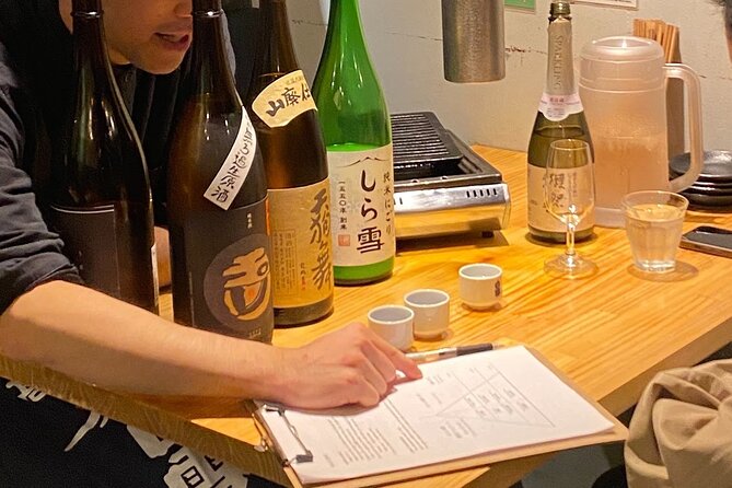 10 kinds Sake Tasting Experience in Tsukiji with local!! - Snacks, conversation, and the Nomuno setting
