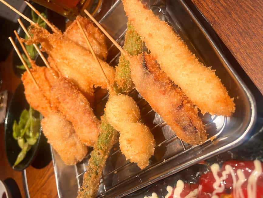 3.5h Osaka Night guided Local Bar Hopping, Sake & Karaoke - A sake stop with several different flavors