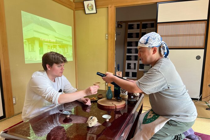 Cultural Sake Brewery Private Tour & Unlimited Tasting Near Tokyo - Entering Yamane Brewery and meeting the people behind it