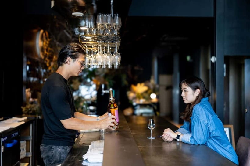 Ginza, Tokyo: Sake Experience with traditional vessels - Tokyo Bay views add atmosphere