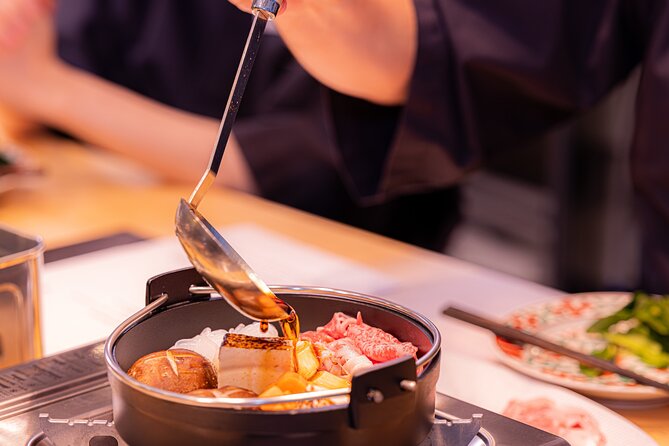 Japanese Sake Tasting & Wagyu Sukiyaki Cooking Class in Tokyo - Cooking Wagyu sukiyaki in the Tokyo studio