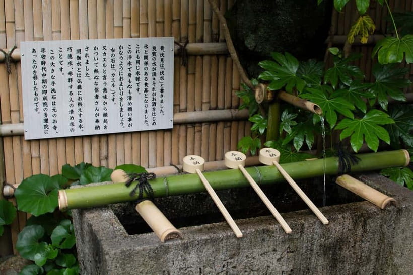 Kyoto: Fushimi Sake District Tour with Boat Ride - Riding the Jikkoku-bune through old transport routes