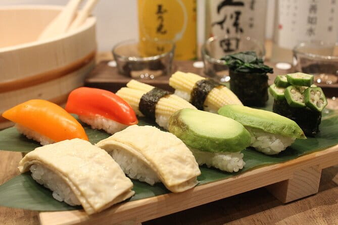 Osaka Cooking Class and Sake Tasting with Local Supermarket Visit - Folding gyoza by hand