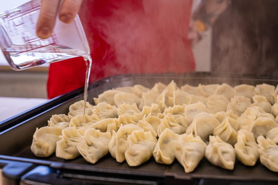 Osaka: Cooking Class & Sake Tasting with Local Market Visit - Niku-sui gives you a taste of local Osaka comfort food