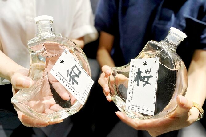 Sake Blending Experience : Craft Your Own Signature Sake - Painting a kanji label gives the bottle a personal identity