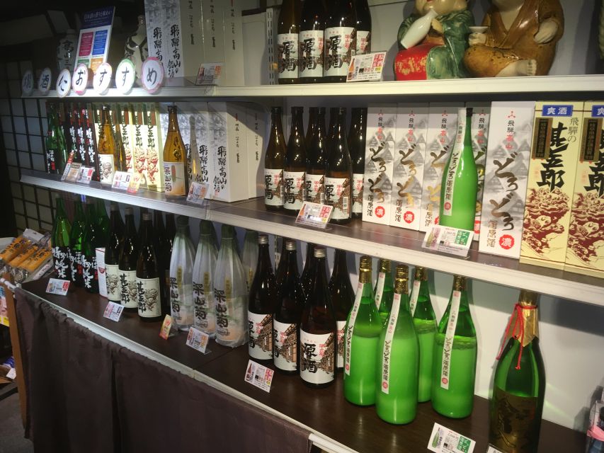 Sake Tasting: Educational Tour of Six Takayama Breweries - Walking from the red bridge into Takayama’s sake district