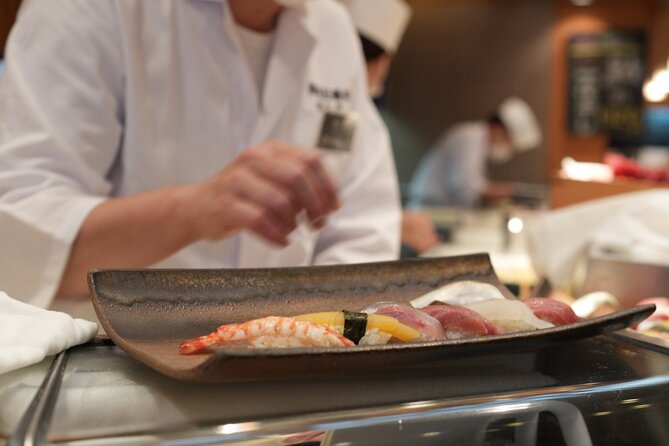 Tsukiji Market Eating Tour, Authentic Sushi & Sake Comparison - A short visit to Namiyoke Inari Shrine