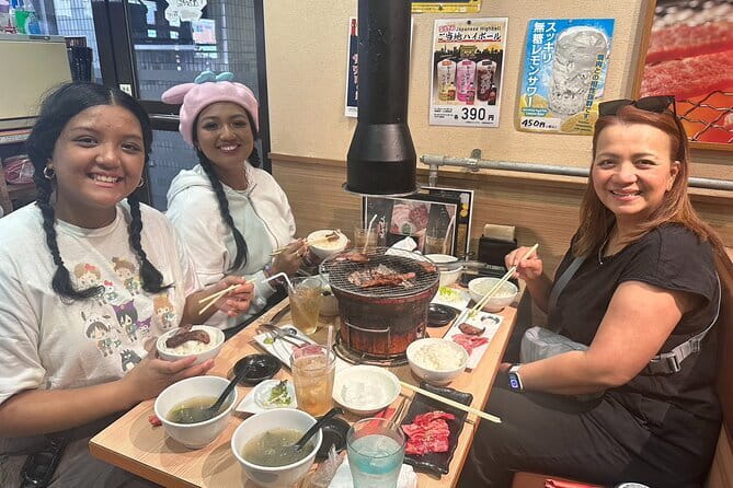 Wagyu Beef and Sake Pairing Foodie Tour in Tokyo - Walking through Ginza after dark